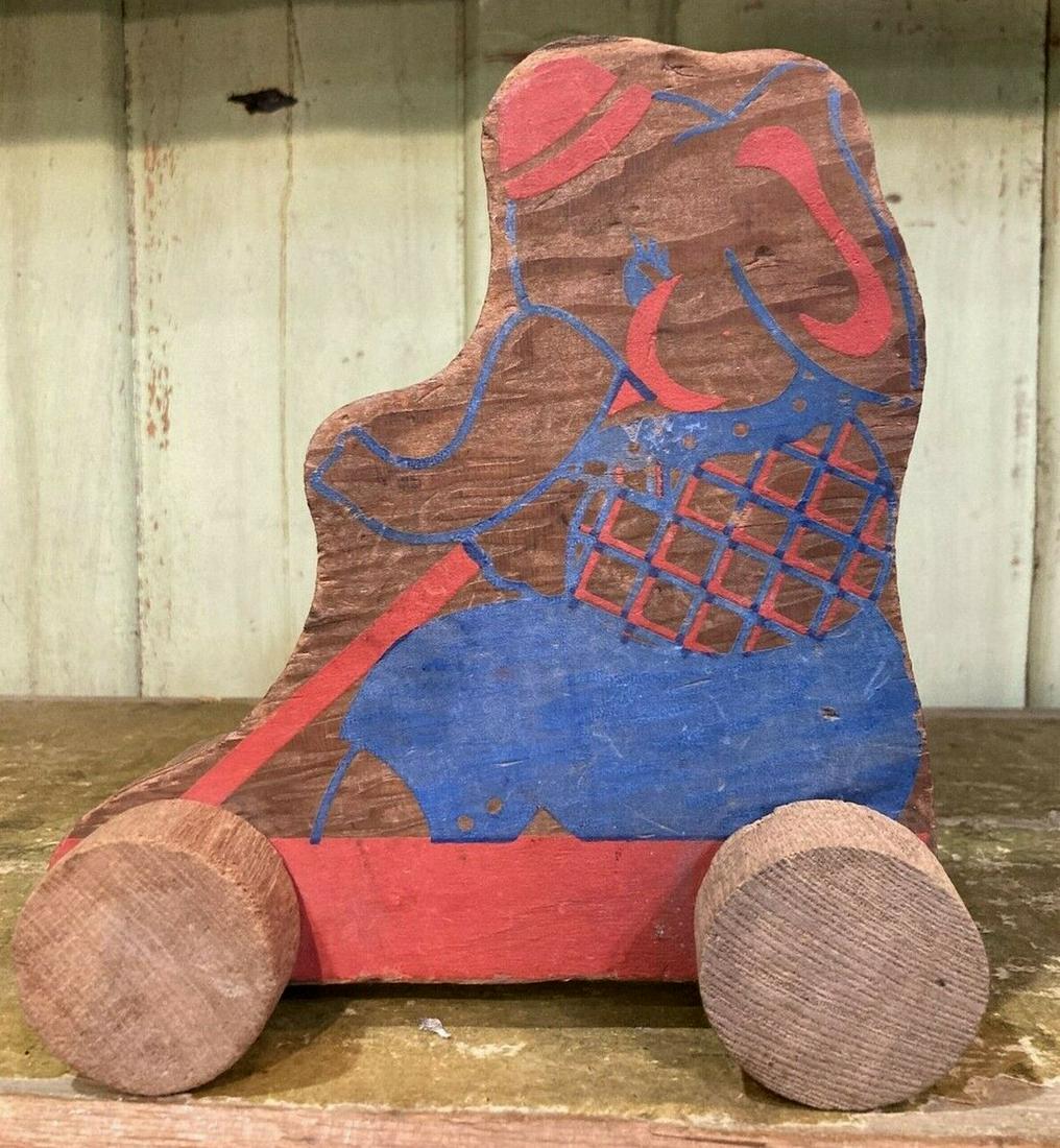 Primitive Wooden Circus Elephant Pull Toy: Title: Primitive Wooden Circus Elephant Pull Toy Date/Period: Approx 1950's Materials: Wood Dimension: Approx 7" tall x 6.5 Long Additional Information: Lovely elephant on cart pull toy Shipping: Dome