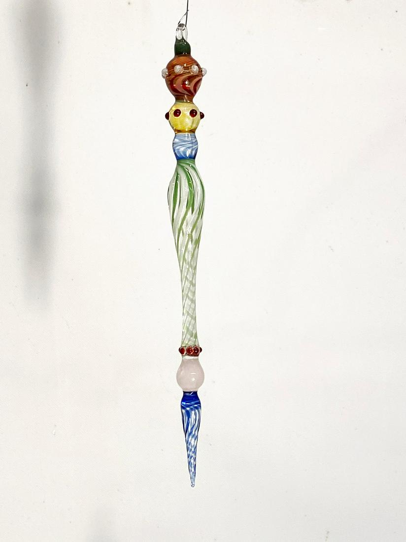 Corning Glass Icicle Ornament: Title: Corning Glass Icicle Ornament Dimension: 9” Provenance/additional info: A Christmas tree decoration. This decoration is a piece of hand blown glass from the world famous Corning Glass Company