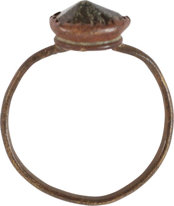 MEDIEVAL FASHION RING 1200-1450 AD, SIZE 4: Size 4. Narrow band, 1.3mm, with rounded face. Circular bezel with a yellow glass "stone" . Uncleaned as found and surface degraded from burial. Gift boxed with certificate of authenticity. Dating to 
