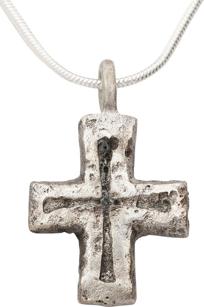 MEDIEVAL PILGRIM'S RELIQUARY CROSS NECKLACE: 7th-10th C. AD. Over 1 1/8" height. Carried by European pilgrims traveling to the Holy Land to visit the land where Christ lived and died, the back is recessed for the inclusion of a holy relic. Profe