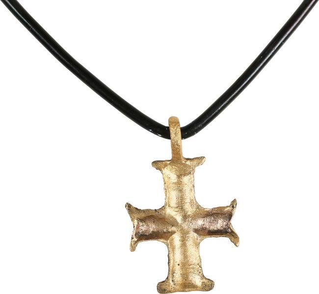 MEDIEVAL RELIQUARY CROSS NECKLACE 11TH-14TH C.: Southern Europe, Italy, or Spain. Gilt bronze, Over 1" height with the central crossbeam. The beam ends flared as with the Maltese Cross and probably evolved from the "crutched" ends of the Jerusalem 
