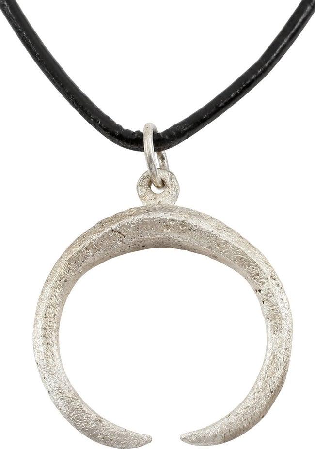 VIKING LUNAR PENDANT NECKLACE C. 900-1000 AD: Near circular, well over 1" width of a thick form, and faceted in section. As expert navigators, the constellations signified mystery and power to Vikings. The Moon was personified as Mani, brother to