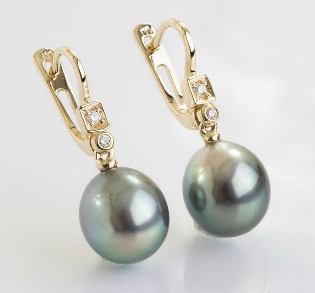14 kt. Yellow Gold - 10x11mm Peacock Tahitian Pearl: Description: Produced by the Pinctada Margaritifera oyster in the tropical lagoons of French Polynesia, these pearls been hand selected for the earrings as their natural magnificent peacock colour wit