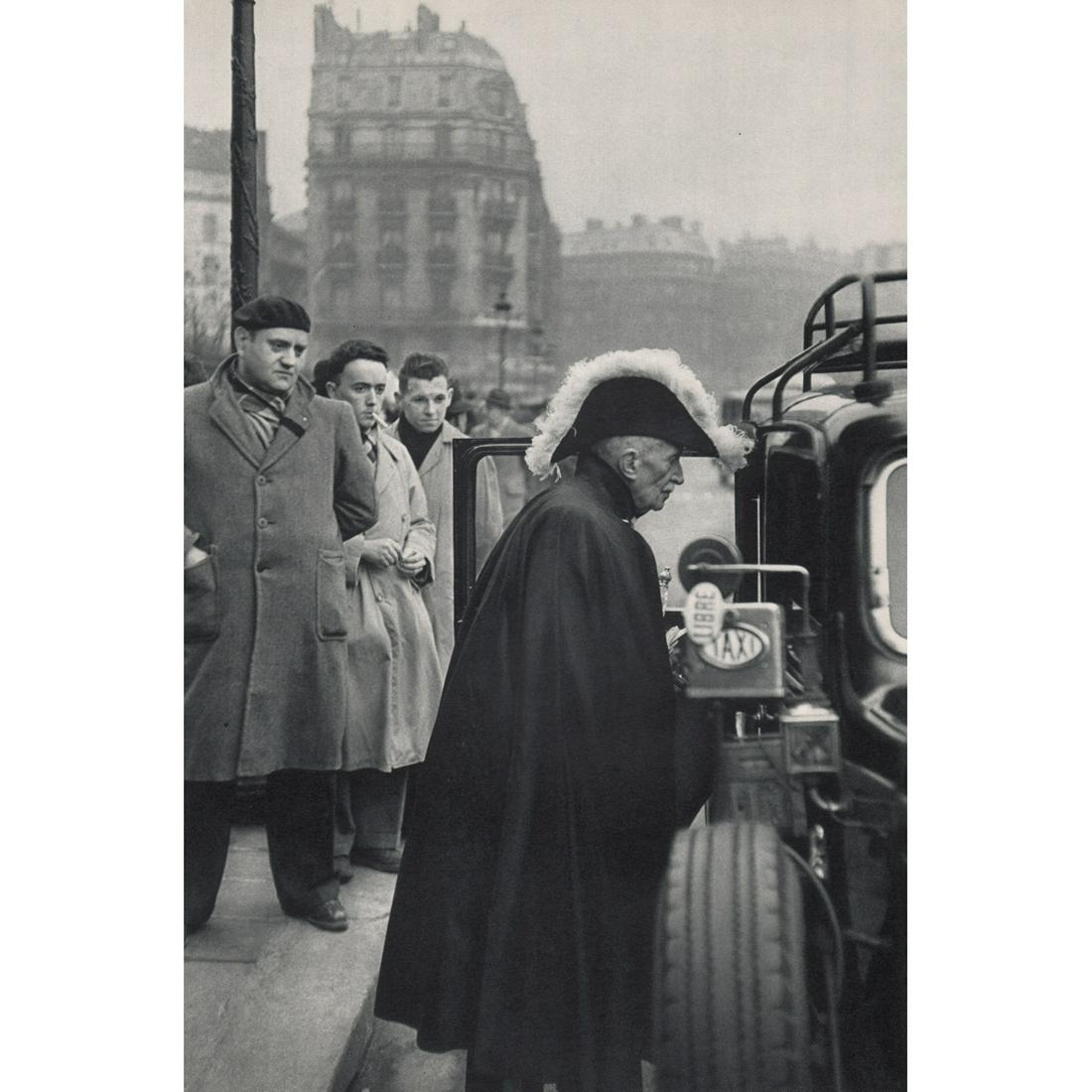 HENRI CARTIER-BRESSON - Member of the French Academy: Artist: HENRI CARTIER-BRESSON Print Title: Member of the French Academy on his way to Notre-Dame Medium: Sheet-fed Gravure Printing Date: 1950's Printed in France Image Size approx: 13.5 x 9 inches He