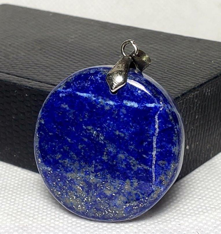 Sterling Silver Lapis Lazuli Pendant: Title: Sterling Silver Lapis Lazuli Pendant Gemstones: Mineral Size/Dimensions: 25X24X10mm Additional Info: Sterling Silver Lapis Lazuli Pendant Reserve: $10.00 Shipping: Domestic: Flat-rate of $23.00