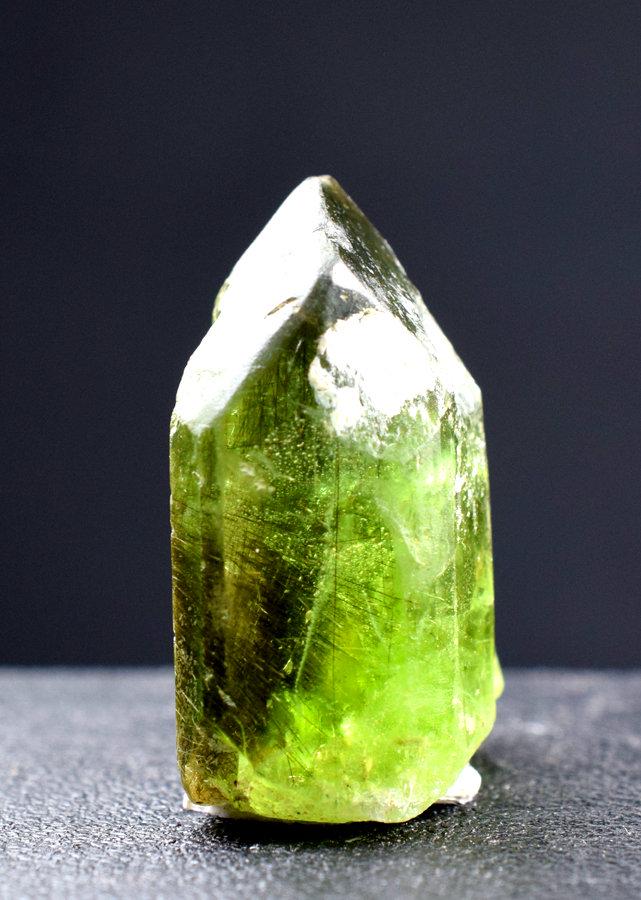 Peridot Crystal , Olivine Peridot Crystal from Sapat: Gemstone, Peridot Description Peridot Crystal , Olivine Peridot Crystal from Sapat Pakistan - Weight : 51.15 carat Size : 27*22*12 mm Treatment : Natural Origin : Pakistan Standard shipping Reserve: $