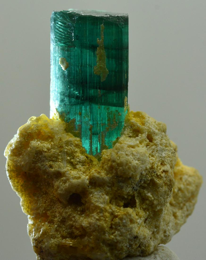 8 Grams Beautiful Blu Tourmaline Specimen: Title:8 Grams Beautiful Blu Tourmaline Specimen Origin: Afghanistan Weight:8 Grams Size/Dimensions:37x27x13 MM Description:Natural Reserve: $75.00 Shipping: Domestic: Flat-rate of $25.00 to anywhere w