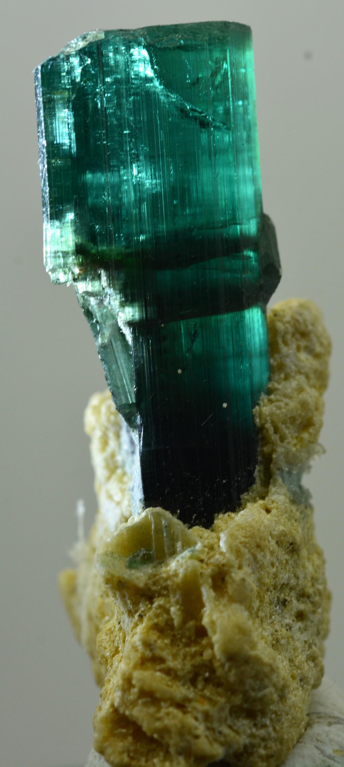 10.4 Grams Beautiful Blu Tourmaline Specimen: Title:10.4 Grams Beautiful Blu Tourmaline Specimen Origin: Afghanistan Weight:10.4 Grams Size/Dimensions:43x25x15 MM Description:Natural Reserve: $75.00 Shipping: Domestic: Flat-rate of $25.00 to anyw