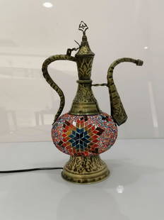 Turkish Mosaic Pitcher lamp: Title: Turkish Mosaic Pitcher lamp Description: A Turkish Pitcher lamp composed of glass inserts creating mosaic geometric patterns. Entirely handmade in Turkey, spectacular if turned on. The lamp was