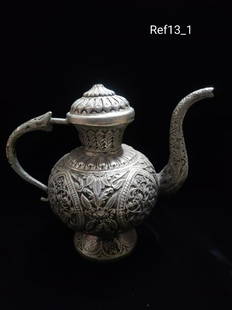 Mughal style ewer: Title: Mughal style ewerDescription: An amazingly beautiful ewer in mughal style having silver plating on it.Beautiful piece of art to be used in home decorDate/period: 20th centDimension: