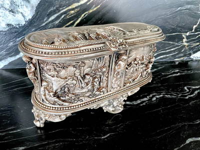 Antique box with hunting scenery ornaments