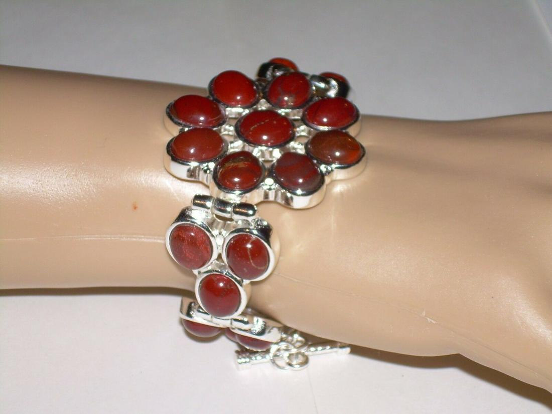 Vintage Flame Jasper Bracelet - Bezel Set - 7.5" -: Vintage link bracelet in silver tone. The bracelet comes with a flower shape center with 2 three set stones accenting each side. The stones are flame jaspers. Bracelet has 21 bezel set jasper stones.