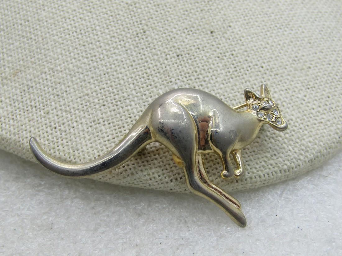 Vintage Gold Tone Kangaroo Brooch 2", 1960's-1970's: Vintage Gold Tone Kangaroo Brooch 2", 1960's-1970's. It is appx. In hopping mode. Gold tone smooth finish with a textured face. Not signed by the maker. Good condition. Light wear. (INV. W.8919.5 SS12