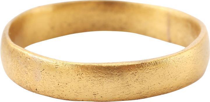 VIKING WOMAN’S WEDDING RING, 900-1050 AD S 7 ½: Size 7 1/2. Rounded band, 3.7mm. Vikings exchanged rings on the pommel of the groom’s sword. Professionally refurbished with the surface restored in 24 karat gold. Good wearable size. Gift boxed