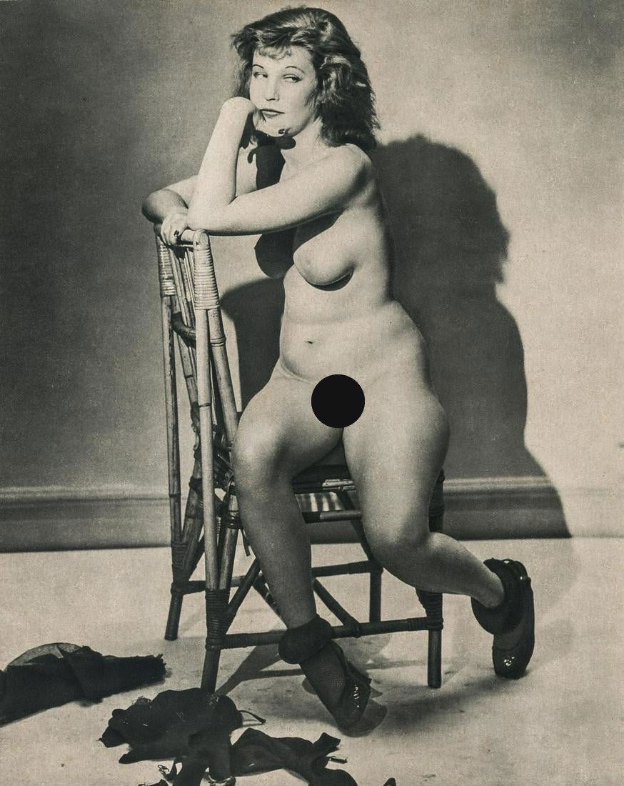 ANDRE DE DIENES - Undressed Nude in Chair: Artist: ANDRE DE DIENES Title: Undressed Nude in Chair Medium: Sheet Fed Gravure, 1950s, France Dimensions: 8.4x10.5" Description: Heat Wax Mounted on 11x14" Conservation Board Artist Bio: Andre De Di