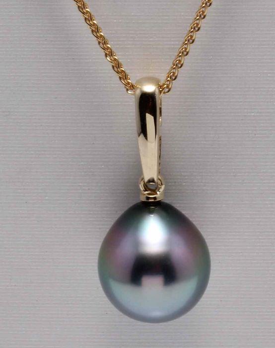 14 kt. Yellow Gold - 10x11mm Peacock Tahitian Pearl: Description: Produced in the tropical lagoons of French Polynesia, this pearl has been specially selected for this pendant as its natural beautiful peacock green colour comes to life combined with the