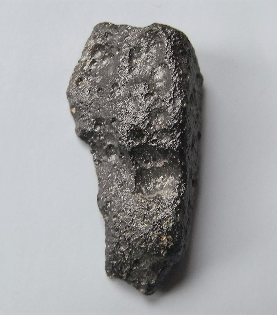 PHILIPPINITE TEKTITE - FROM METEORITE IMPACT: Title: PHILIPPINITE TEKTITE - FROM METEORITE IMPACT Origin: Paracale, Camarines Norte, Luzon, Philippines Size: 2.5x1.5x1 cm / 4 gram elongate rizalite/philippinite tektite with triangular cross secti