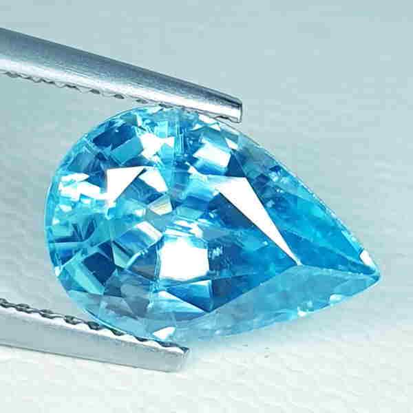 4.93 ct "IGI Certified" Natural Blue Zircon: Title: 4.93 ct "IGI Certified" Natural Blue Zircon Brand: Blue Zircon Gemstones: Loosegemstone Color/Clarity: VVS Carat Weights: 4.93 Size/Dimensions: 12.25 x 8.24 x 5.63 Additional Information: Inter