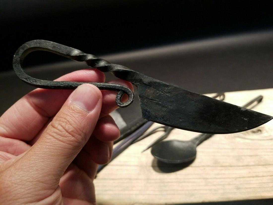 Flint Striker Style Forged Knife Utensil Set: 10 1/4" Long x 2 5/8" Wide Knife 6" L 1 7/8" Wide fork 6 3/4" Long Spoon 7 1/2" Nice hand made flint striker style knife. As you can see the talented craftsman curled the handle into the shape of an a