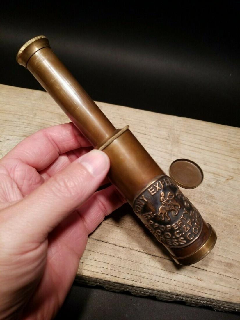 Brass Pony Express Traveling Pocket Telescope: Telescope measures 3 3/4" Long closed x 6 1/4" open Nice quality reproduction of a traveling pocket telescope and cap. This piece is all brass with a Pony Express design on it. While its not super str