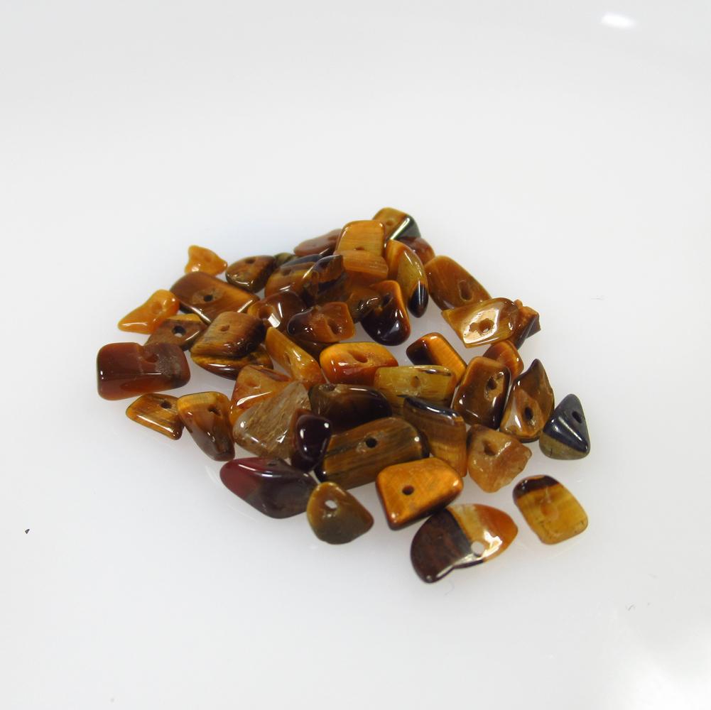 18.74 Ct Natural 47 Tiger's eye Unshaped Beads: No Reserve! Title: 18.74 Ct Natural 47 Tiger's eye Unshaped Beads Stone Clarity: Opaque Gemstones: Tiger's eye Beads Carat Weights: 18.74 Size/Dimensions: 4.5x3.0 - 8.0x5.0 mm / 47 PC's Additional Inf