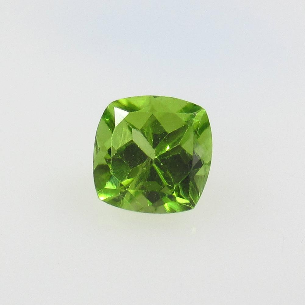 1.79 Ct Natural Pakistan Peridot Cushion Cut: No Reserve! Title: 1.79 Ct Natural Pakistan Peridot Cushion Cut Stone Clarity: VVS Gemstones: Natural Peridot Carat Weights: 1.79 Size/Dimensions: 7.20 x 7.20 x 5.00 mm Additional Information: Top Cla