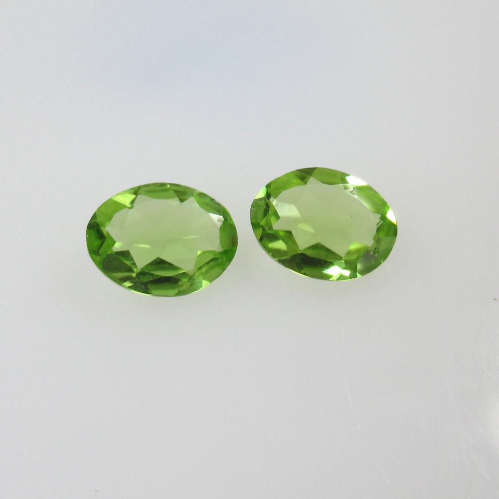 2.66 Ct Natural Pakistan Peridot Oval Pair: No Reserve! Title: 2.66 Ct Natural Pakistan Peridot Oval Pair Stone Clarity: VVS Gemstones: Natural Peridot Carat Weights: 2.66 Size/Dimensions: 9.00 x 7.00 x 3.00 mm / 2 PC's Additional Information: 