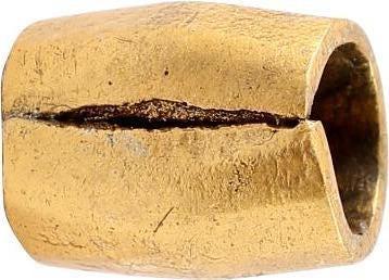 ANCIENT VIKING GILT BEAD, 9TH-11TH CENTURY AD: 9.5mm length, just over 1/3inch. Hand formed from bronze, forged to hexagonal section with the center swelled to a ridge. Butted seam. Professionally refurbished with the 24karat gold overlay restored