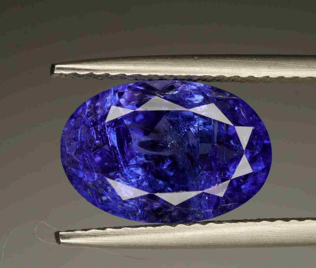 4.46 carat Natural Tanzanite: Title: 4.46 carat Natural Tanzanite Shape: OVAL MIXED CUT Color: Intense Blue Gemstone Type: Natural Tanzanite Carat Weights: 4.46 CARAT Transparency: Transparent Origin: Tanzania Additional Informati
