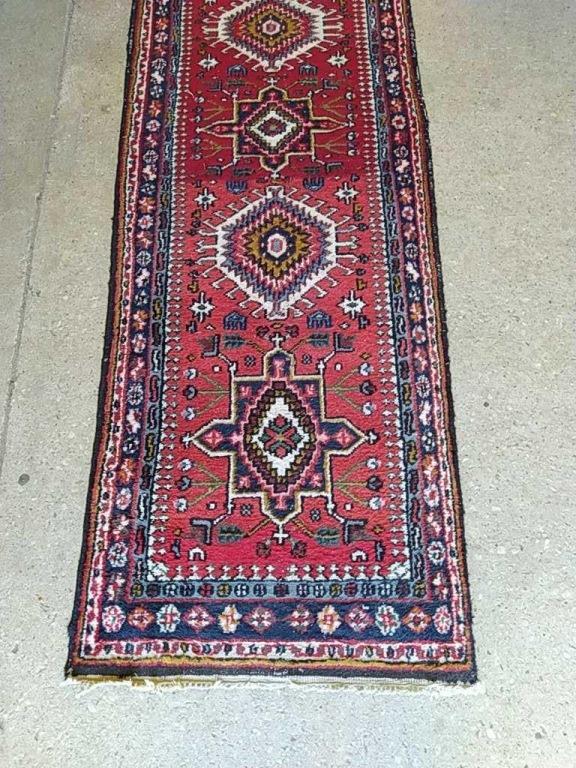 Semi Antique Hand Woven Persian Heriz 10x2.2: Title: Semi Antique Hand Woven Persian Heriz 10x2.2 Origin: Iran Size: 10x2.2 Material: 100 % Wool Circa:1980 Description: Semi Antique Hand Woven Persian Heriz 10x2.2 Reserve: $100.00 Shipping: Dome