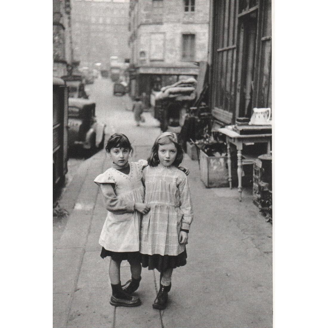 EDOUARD BOUBAT - Two Young Girls: Artist: EDOUARD BOUBAT Print Title: Two Young Girls, Paris 1953 Medium: Sheet-Fed Gravure Printing Date: 1970's Printed in France Image Size: 6.5 x 4.5 inches Edouard Boubat (1923-1999) was a French p