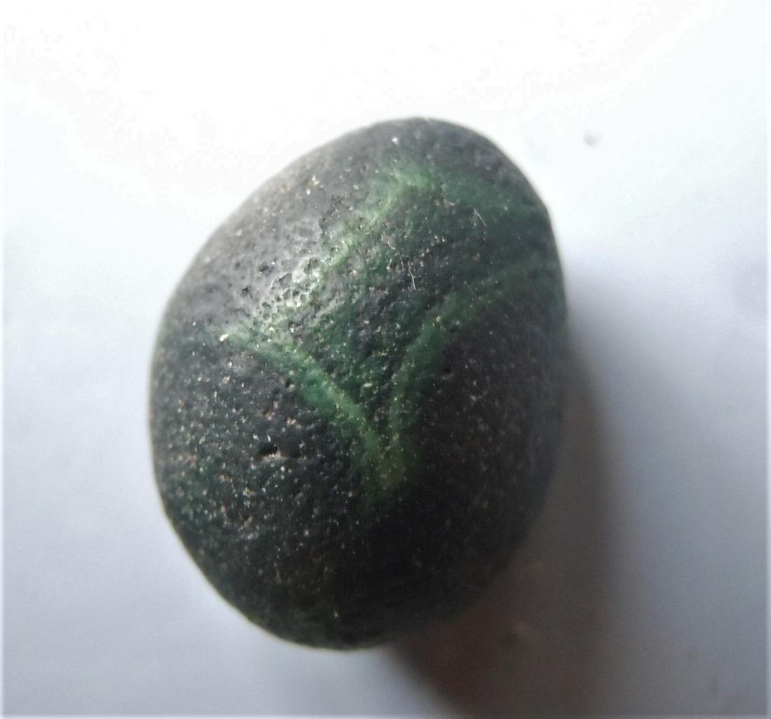 EXCELLENT EYE AGATE: Title: EXCELLENT EYE AGATE Origin: Alashan Area, Gobi Desert, Inner Mongolia, China Size: 3.1x1.9x1.9 cm / 12 gram dark blue-green and brown eye agate with excellent sculpture Reserve: $7.00 Shipping: