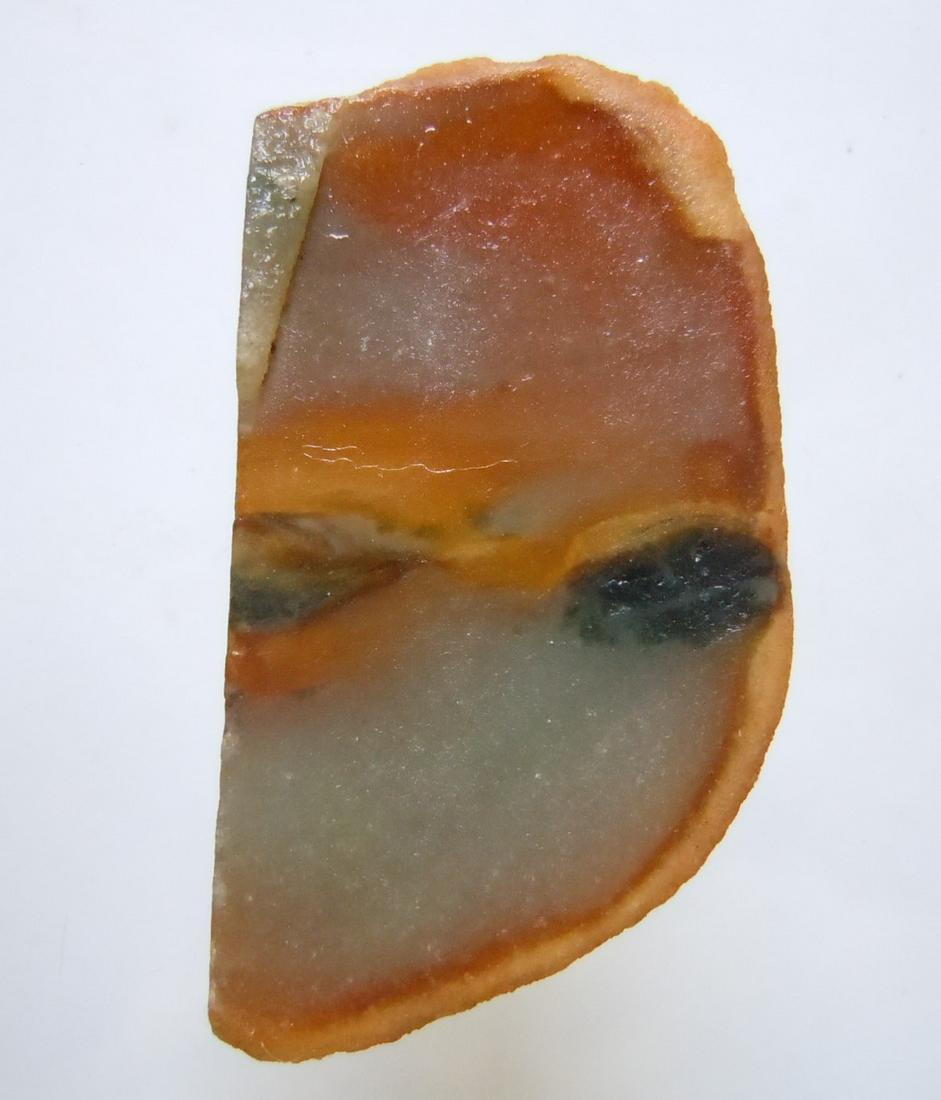 GENUINE BURMESE JADEITE JADE: No Reserve! Title: GENUINE BURMESE JADEITE JADE Origin: Hpakant, Kaching State, Myanmar Size: 3x1.6x0.4 cm / 4.35 gram brown, slightly translucent jadeite jade. one side with natural skin. untreated g