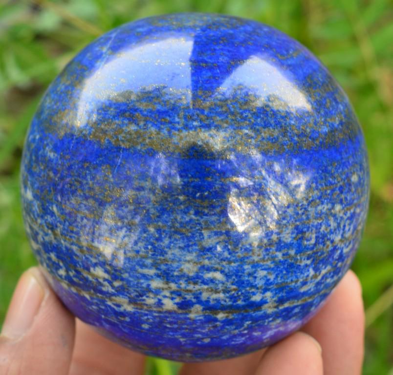 745 Grams Roayal Blue Lapis Lazuli with Pyrite Combine: Title: 745 Grams Roayal Blue Lapis Lazuli with Pyrite Combine Sphere Ball Origin: Afghanistan Weight: 745 Grams Size/Dimensions: 77 MM Description: Natural Reserve: $100.00 Shipping: Domestic: Flat-ra