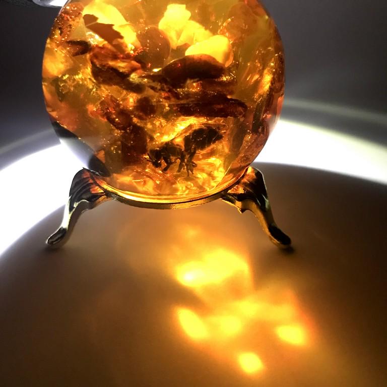 Staggering Vintage Amber Ball with inclusion on a (1 of 9)