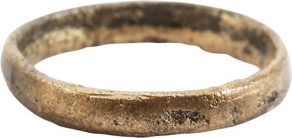 VIKING WEDDING RING 866-1067 AD, SIZE 4 1/2: Danelaw England. 3.0mm width with rounded face. Made with a central core to distribute the molten metal and heat. The core was then laboriously removed by hand with the remnants still visible. Vikings