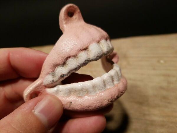 Cast Iron Folk Art Beer Soda Bottle Cap Teeth Opener: Great folk art cast iron bottle opener. This piece was hand painted and aged to look like an antique. All our items come with a 100% customer satisfaction guarantee. About the Items: The item in the i