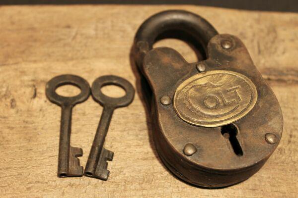 Colt Firearms Ammo Box Padlock Lock & Key: 3 3/4" tall x 2 1/8" Wide Nice reproduction cast iron Colt padlock! This lock is fully functional! Hard to tell its age. Heavy iron and brass. Great aged patina throughout. Limited quantity available!