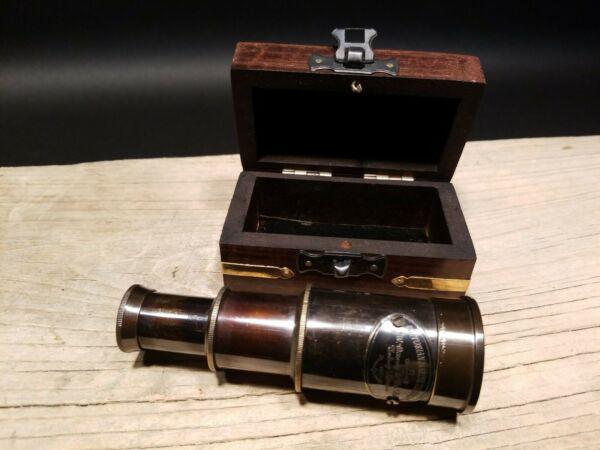 Victorian Marine Wood Box w Telescope: Box measures 3 3/4" Long x 2 1/8 wide x 2" tall Telescope measures 2 1/2" Long closed x 4 1/2" open Nice quality reproduction of a traveling pocket telescope and cap. This piece is all brass with a ha