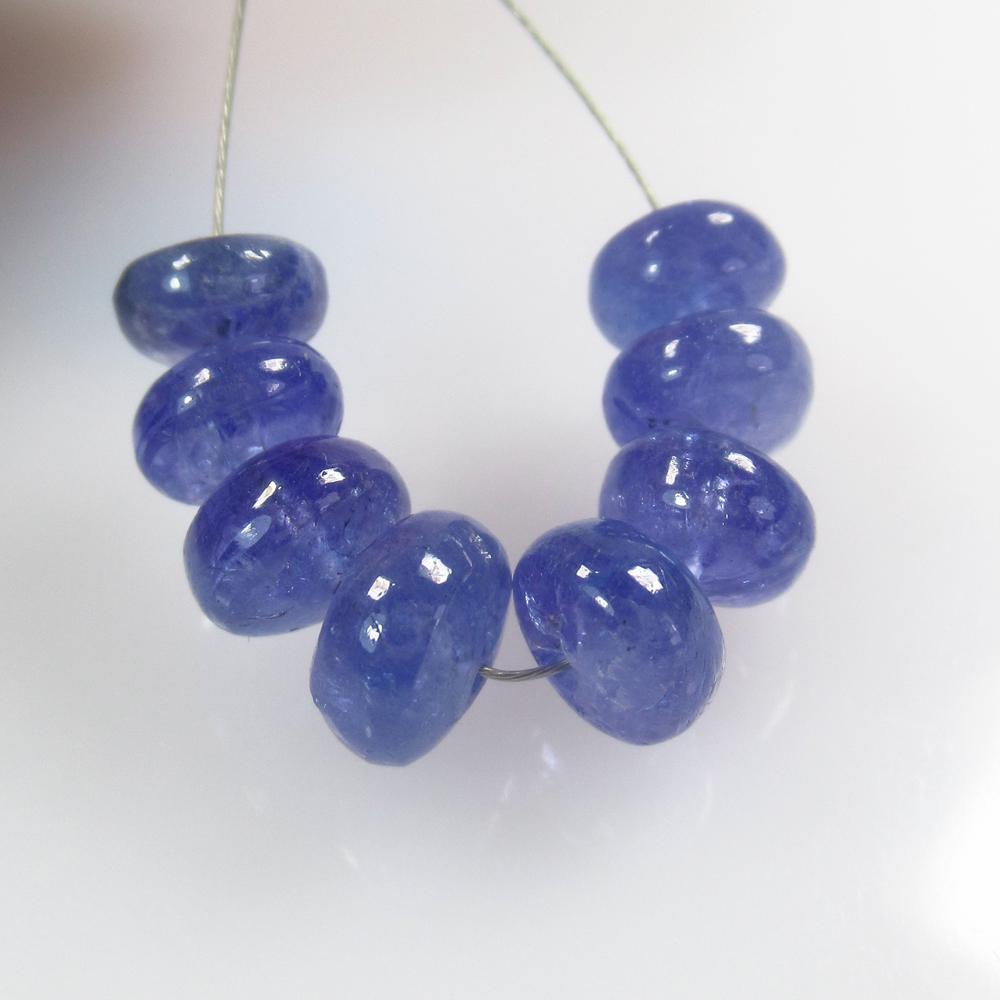 17.08 Ctw Natural 8 Drilled Tanzanite Round Beads: No Reserve! Title: 17.08 Ctw Natural 8 Drilled Tanzanite Round Beads Stone Clarity: 17.08 Gemstone: Tanzanite Beads Size/ Dimensions: 17.08 Carat Weights:6.80 - 7.30 mm / 8 PC's Additional Info: Drill