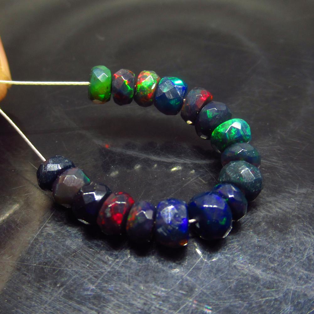 6.25 Ctw Natural 21 Drilled Faceted Black Opal Beads: No Reserve! Title: 6.25 Ctw Natural 21 Drilled Faceted Black Opal Beads Stone Clarity: 6.25 Gemstone: Faceted Black Opal Beads Size/ Dimensions: 6.25 Carat Weights:5.00 to 5.30 mm / 21 PC's Additional