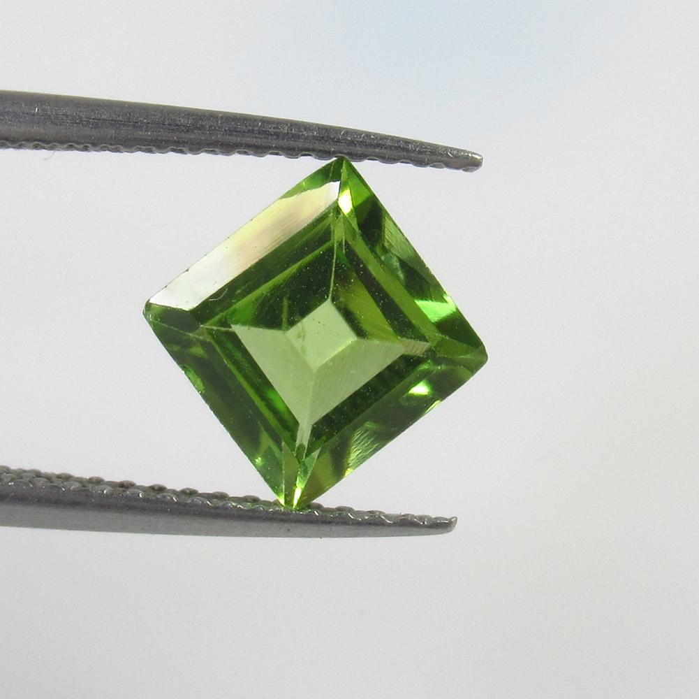 1.67 Ctw Natural Pakistan Peridot Square Cut: No Reserve! Title: 1.67 Ctw Natural Pakistan Peridot Square Cut Stone Clarity: VVS Gemstone: Peridot Carat Weight: 1.67 Size/Dimensions: 7.00 x 7.00 x 4.00 mm Additional Information: Top Class Luster 