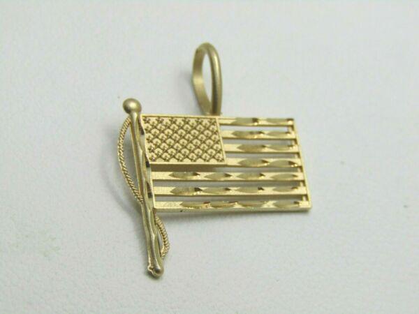 Vintage 14kt US Flag Charm, Pendant, with Pole, Michael: Vintage 14kt USA Flag Charm, Pendant - It is 1" by 3/4 with a space between the stripes and diamond cut accents with flagpole. Signed MA, which is for Michael Anthony. It has a satin or brushed finish
