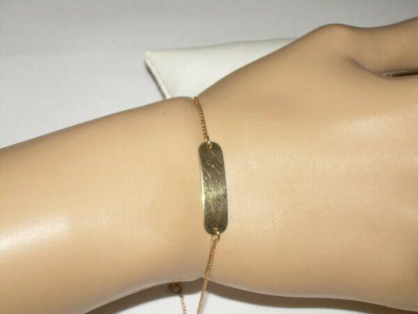 10kt 9" Bar Anklet Bracelet: Vintage 10kt gold chain link bar anklet is 9" in length. The bar is 1" long. The bracelet can be worn as a bracelet or an anklet but is more suited as an anklet. The bar could have a name or initials