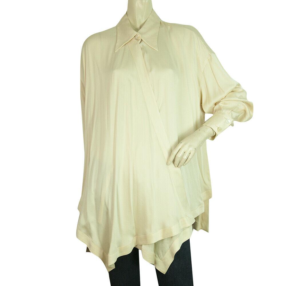 Max Mara Cream Pure Silk Asymmetrical Long Sleeves Top: Max Mara Cream Pure Silk Asymmetrical Long Sleeves Top Blouse size 44 Add unique style to your outfit with this amazing top from the house of Max Mara!! Detailed with a pointed collar, half wrap - hal