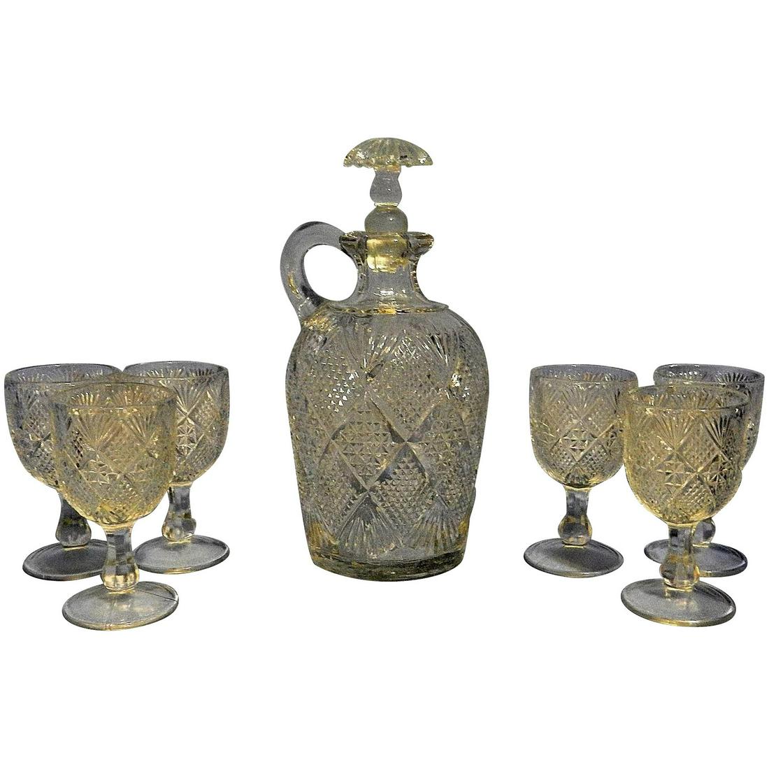Antique EAPG Model Flint PEERLESS /Sunburst Diamond: This Antique EAPG Model Flint PEERLESS /Sunburst Diamond Decanter and Glasses ca. 1890’s is in excellent condition. The stopper appears not to be original but fits well. Early 19th century glass con