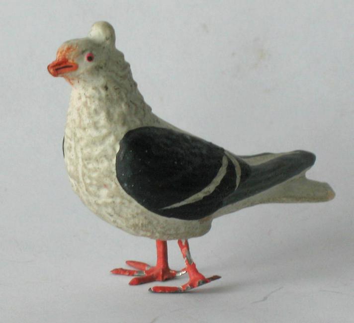 RARE early composition Cockatoo figure. (1 of 3)