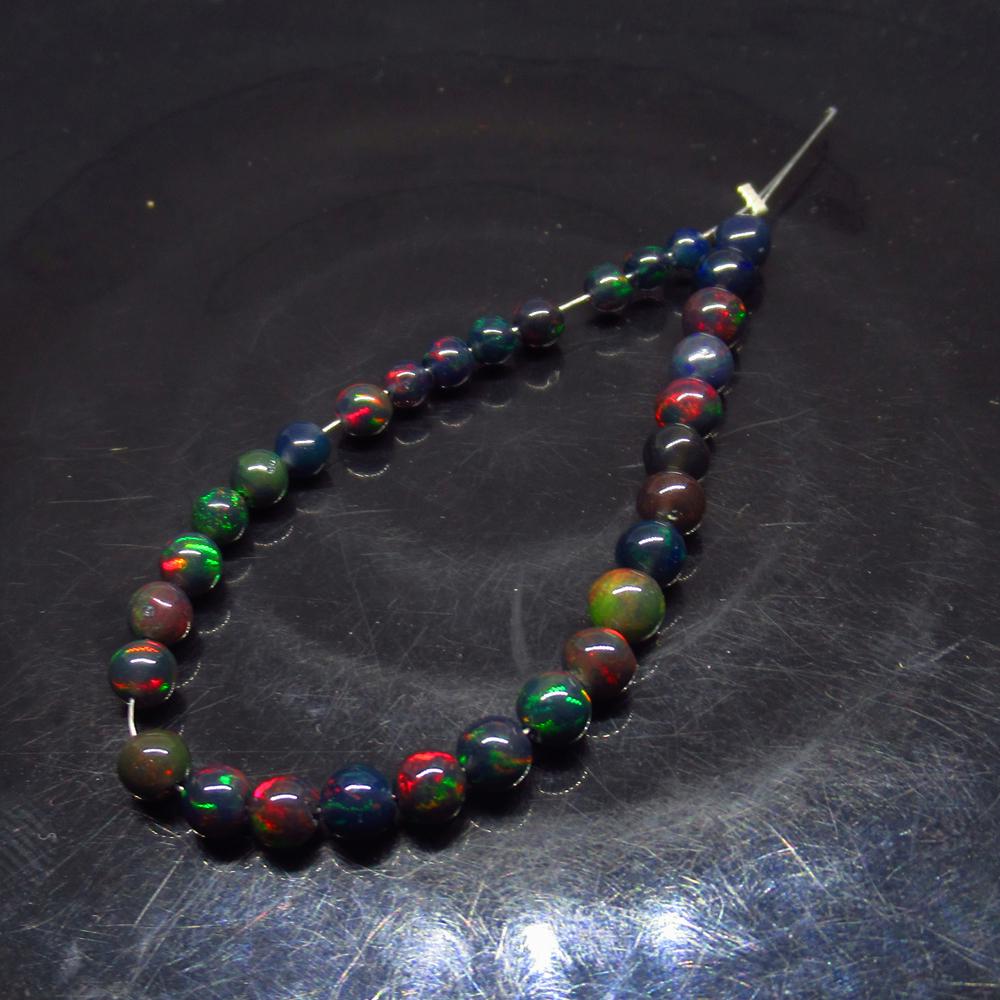 9.75 Ct Natural 31 Drilled Black Fire Opal Ball Beads (1 of 2)