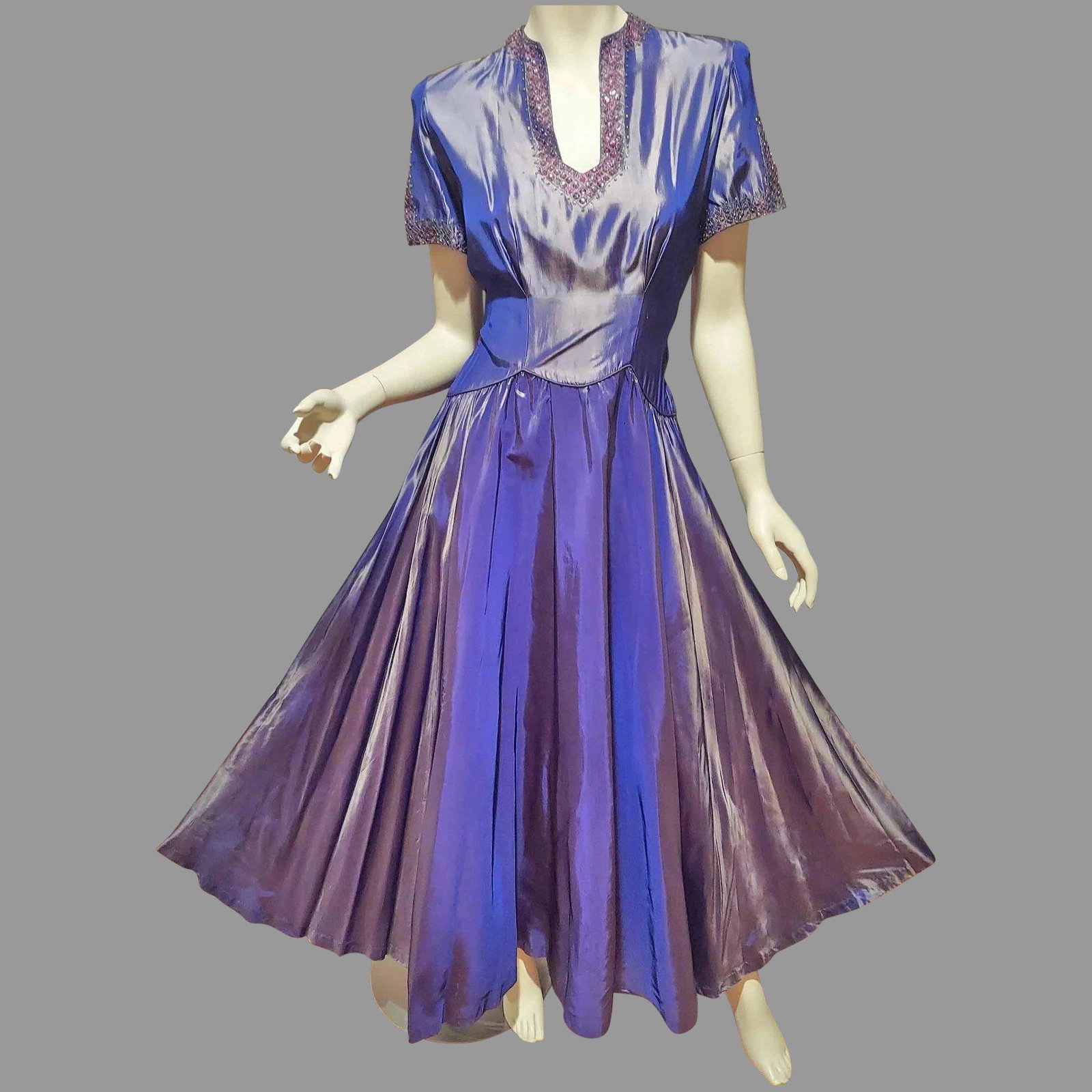 Vtg 1940's Antique Lavender Taffeta gown Embellished: Stunning Circa 1940's Evening Taffeta Ball Gown in an antique Lavender coloration. Sort of a Taffeta Shark skin. With hand beaded and sequins on Neckline and Sleeve detail. Very full pleated skirt wit