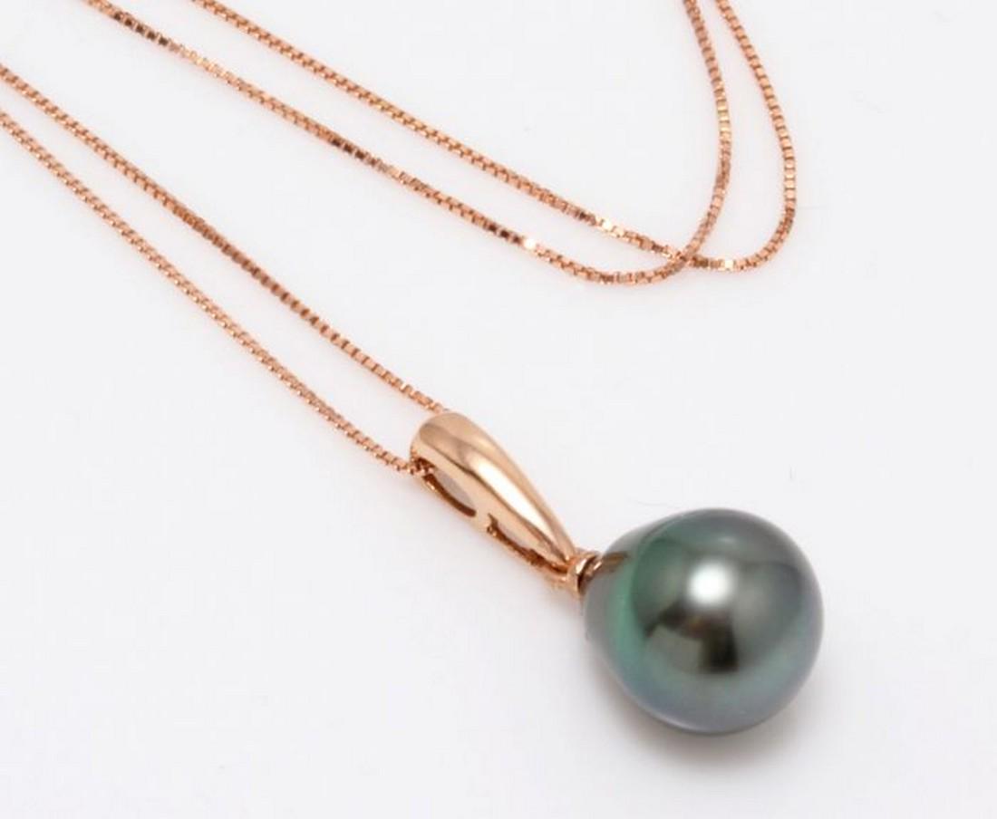 14 kt. Rose Gold - 10x11mm Peacock Tahitian Pearl Drop: Description: Emerging from the tropical lagoons of French Polynesia, this pearl has been hand selected for this pendant as its natural beautiful Tahiti green colour comes to life combined with the ros